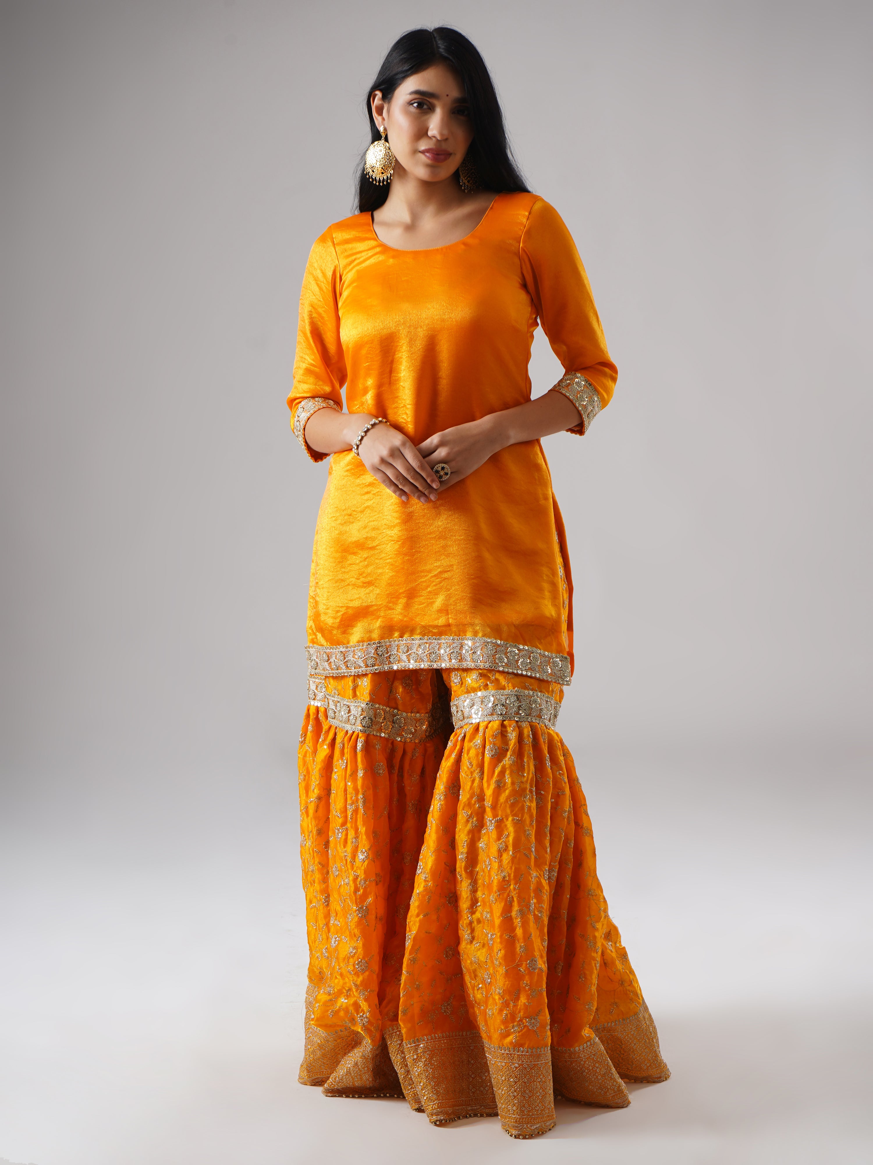 Mehrigold gharara set by Zahrat worn by model, front view without dupatta, featuring the gharara and kurta.