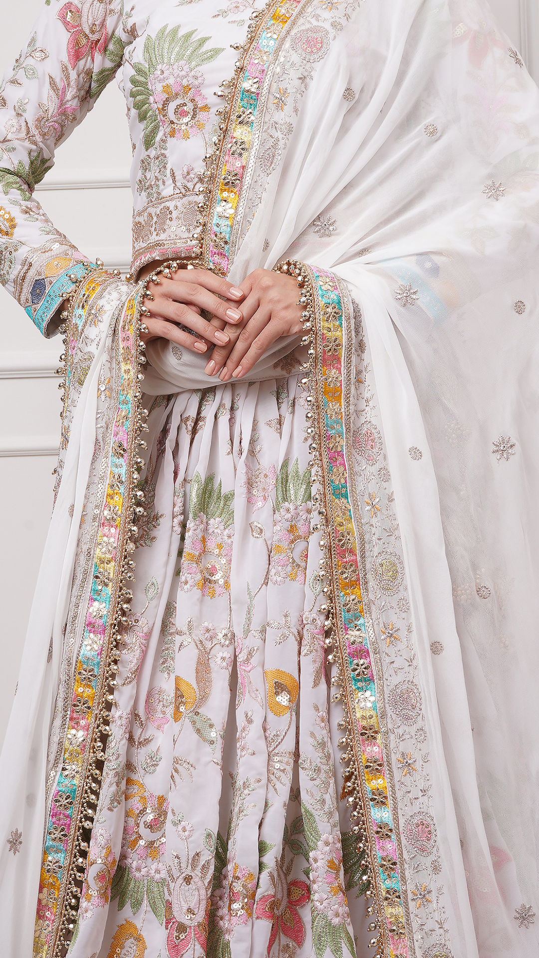 A close-up of Eira Bloom Lehenga Set - Zahrat White Embroidered Lehenga 