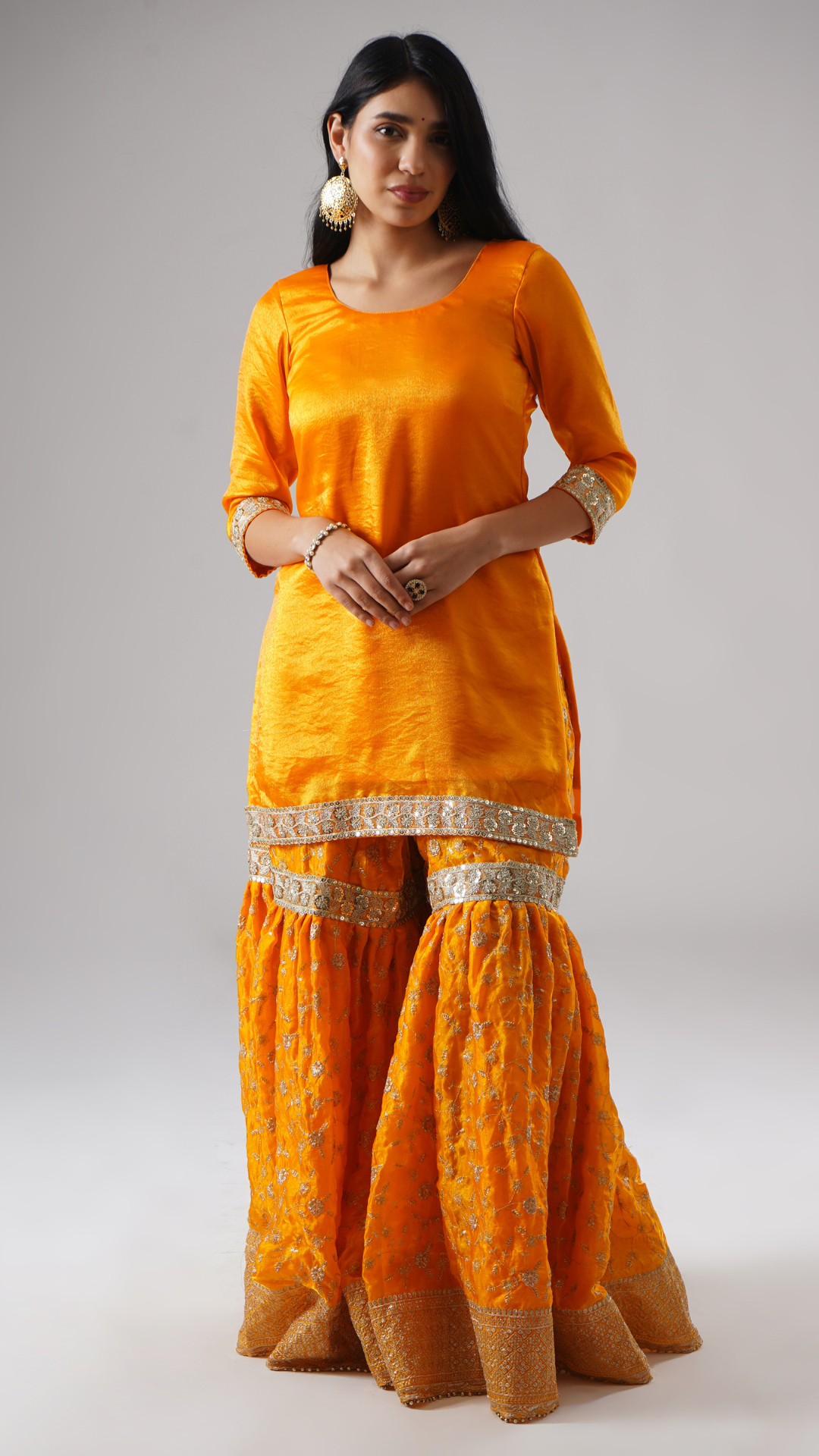 Mehrigold gharara set by Zahrat worn by model, front view without dupatta, featuring the gharara and kurta.