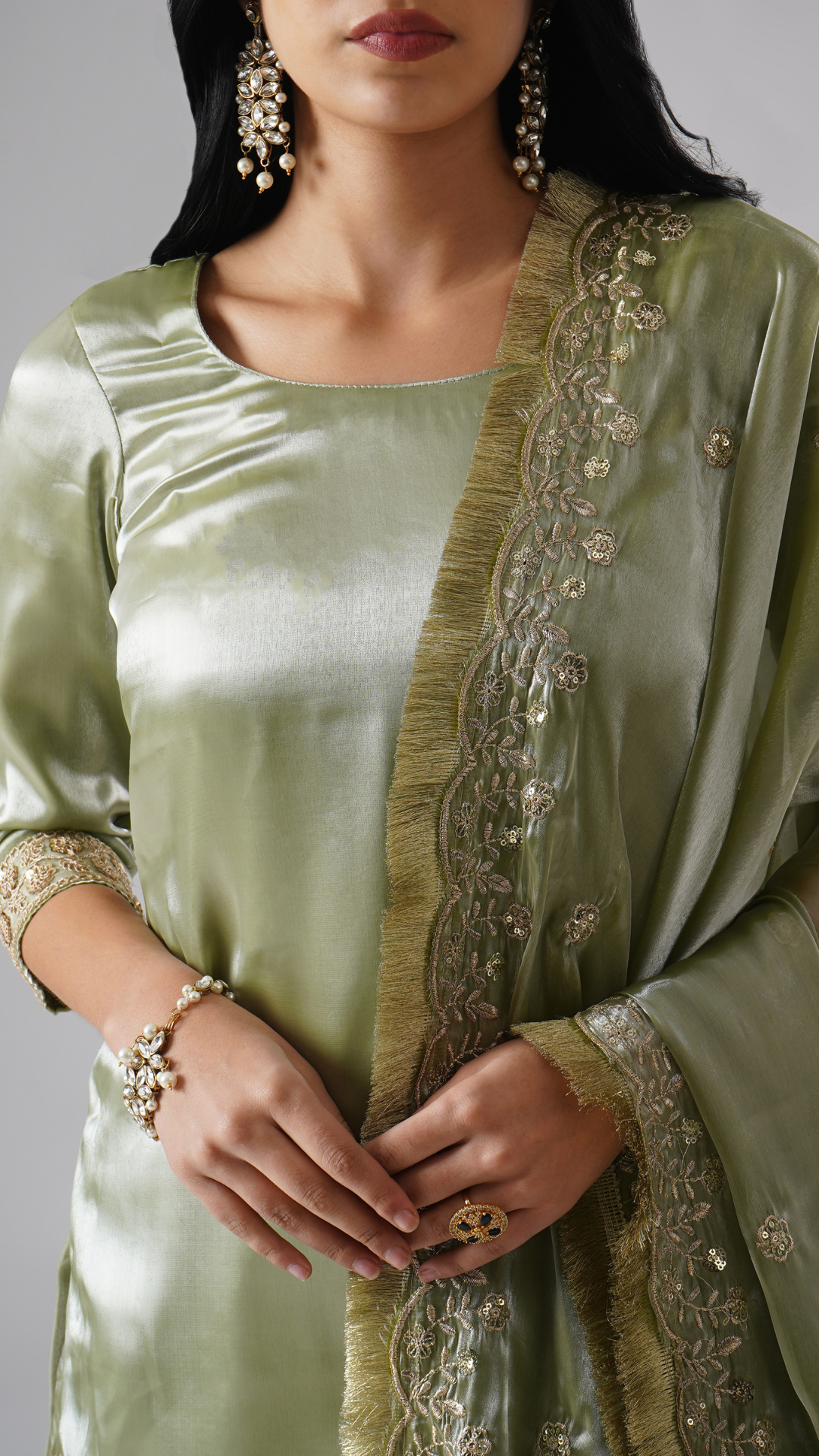 Close-up of Zahrat’s Mehr-e-Zaytuni – The Olive Whisper gharara set, highlighting the dupatta design and kurta fabric texture.