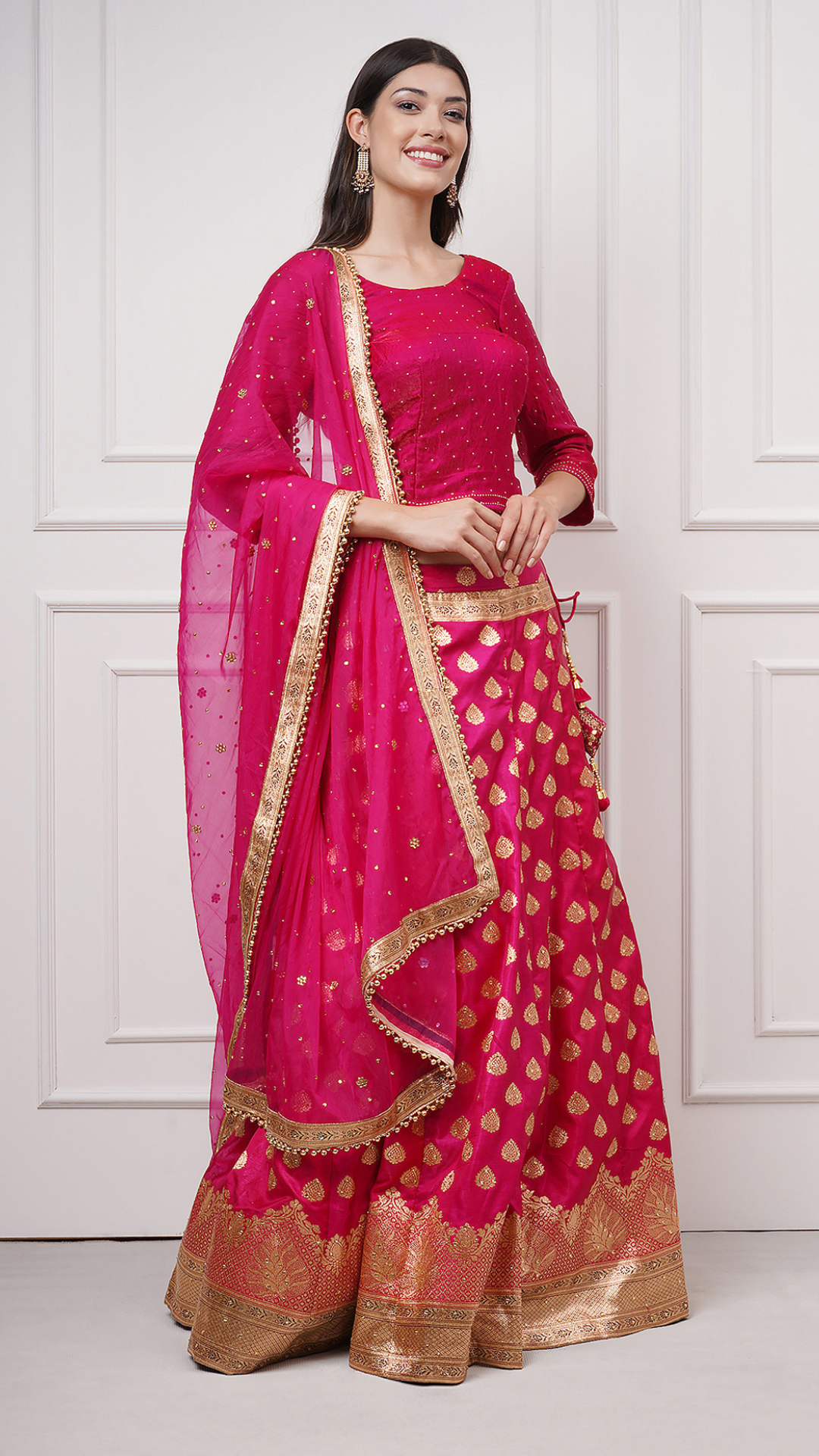 Fiorra Deep Pink Banarasi Lehenga Set by Zahrat
