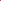 Red fabric with white floral patterns on a green background