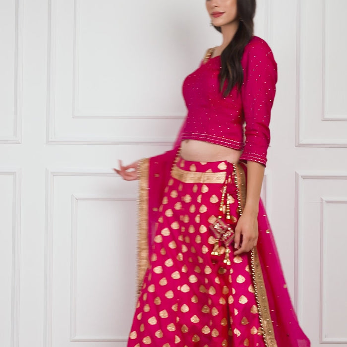 Model twirls gracefully in the Fiorra Banarasi Lehenga Set, highlighting the flow of the graceful skirt, elegant zari work, and refined festive charm