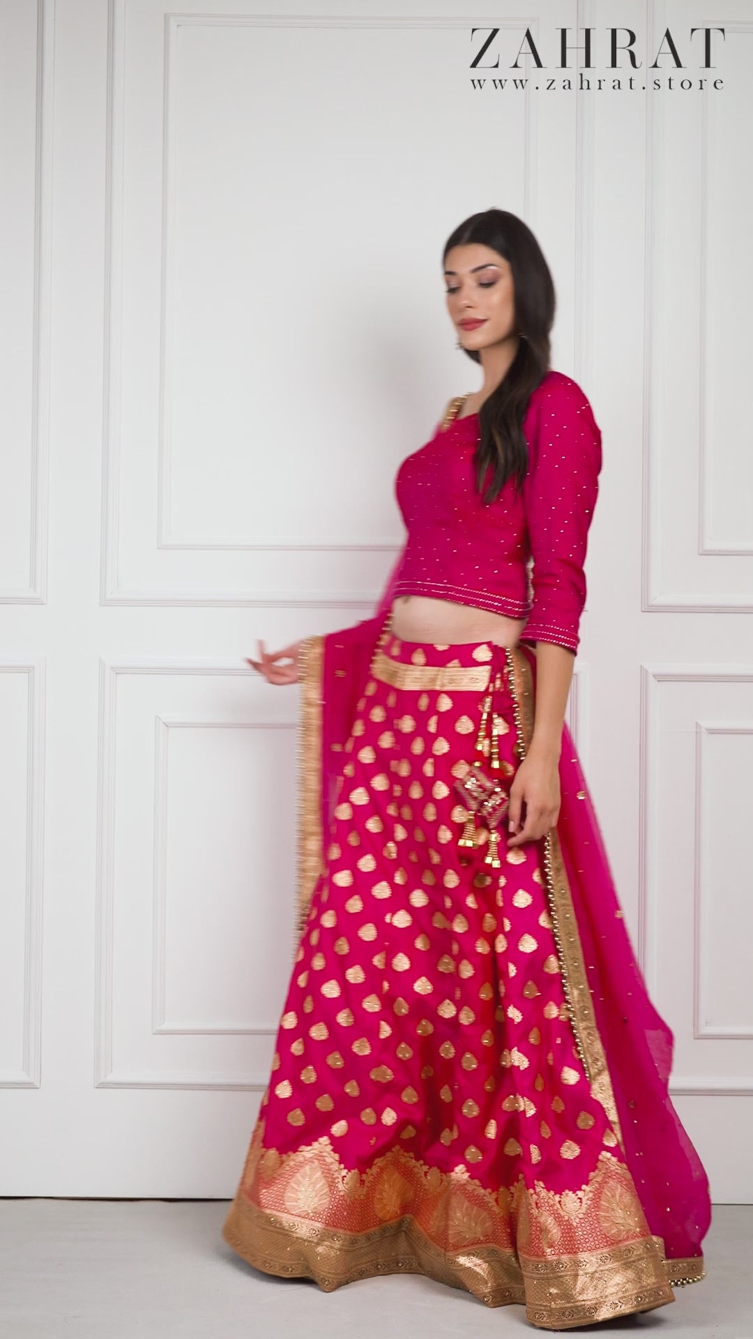 Model twirls gracefully in the Fiorra Banarasi Lehenga Set, highlighting the flow of the graceful skirt, elegant zari work, and refined festive charm