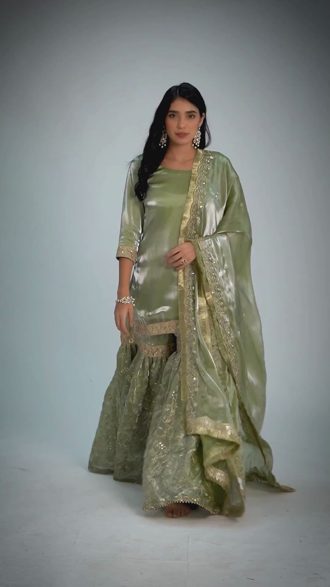 Zahrat Mehr-e-Zaytuni Olive Whisper Gharara – pastel olive green wedding gharara set with gold zari embroidery, flared pants, detailed kurta, and matching dupatta, perfect for weddings and festive celebrations