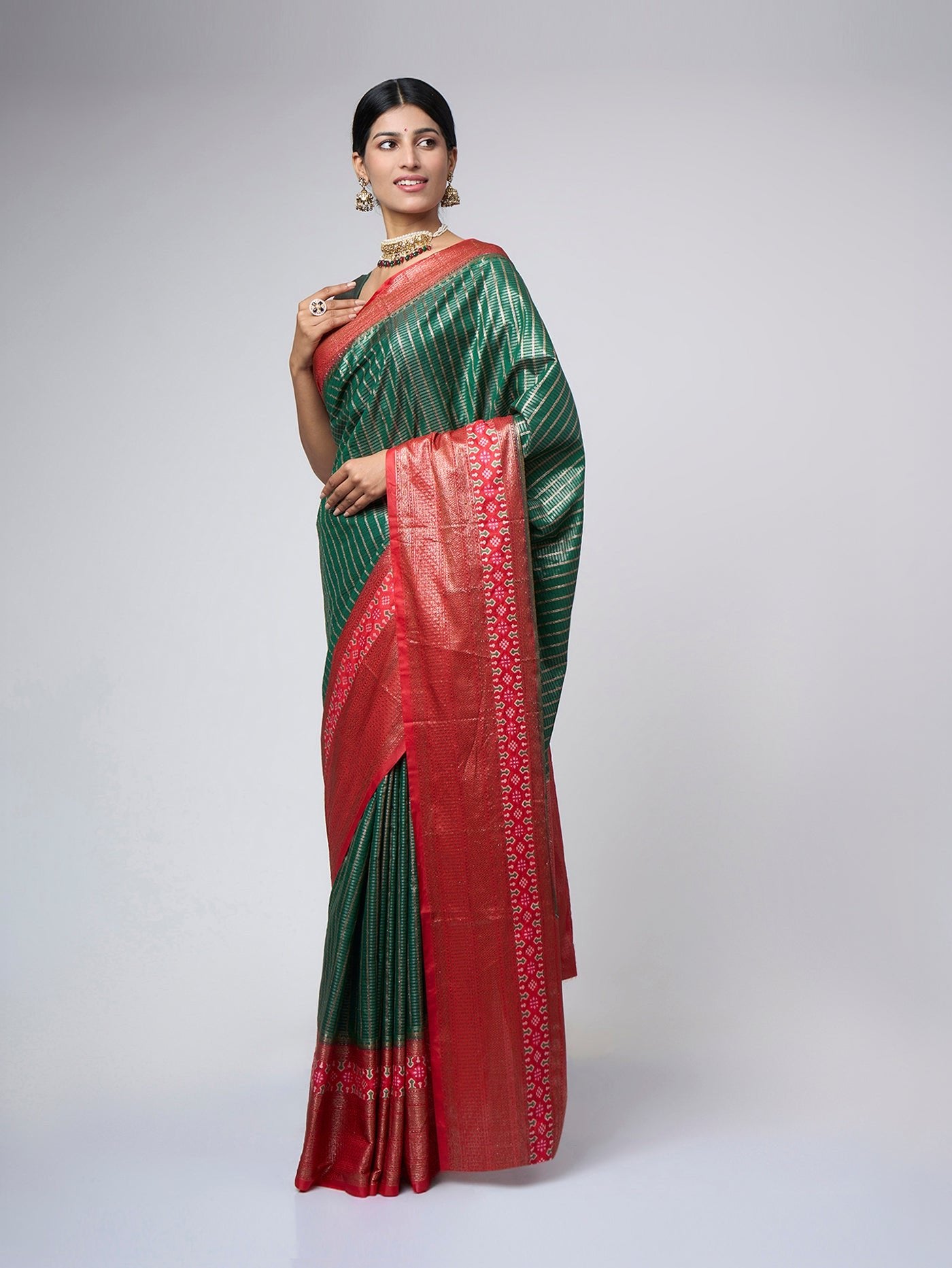 Vermaya - Green silk blend saree with red zari accents - ZahratSaree