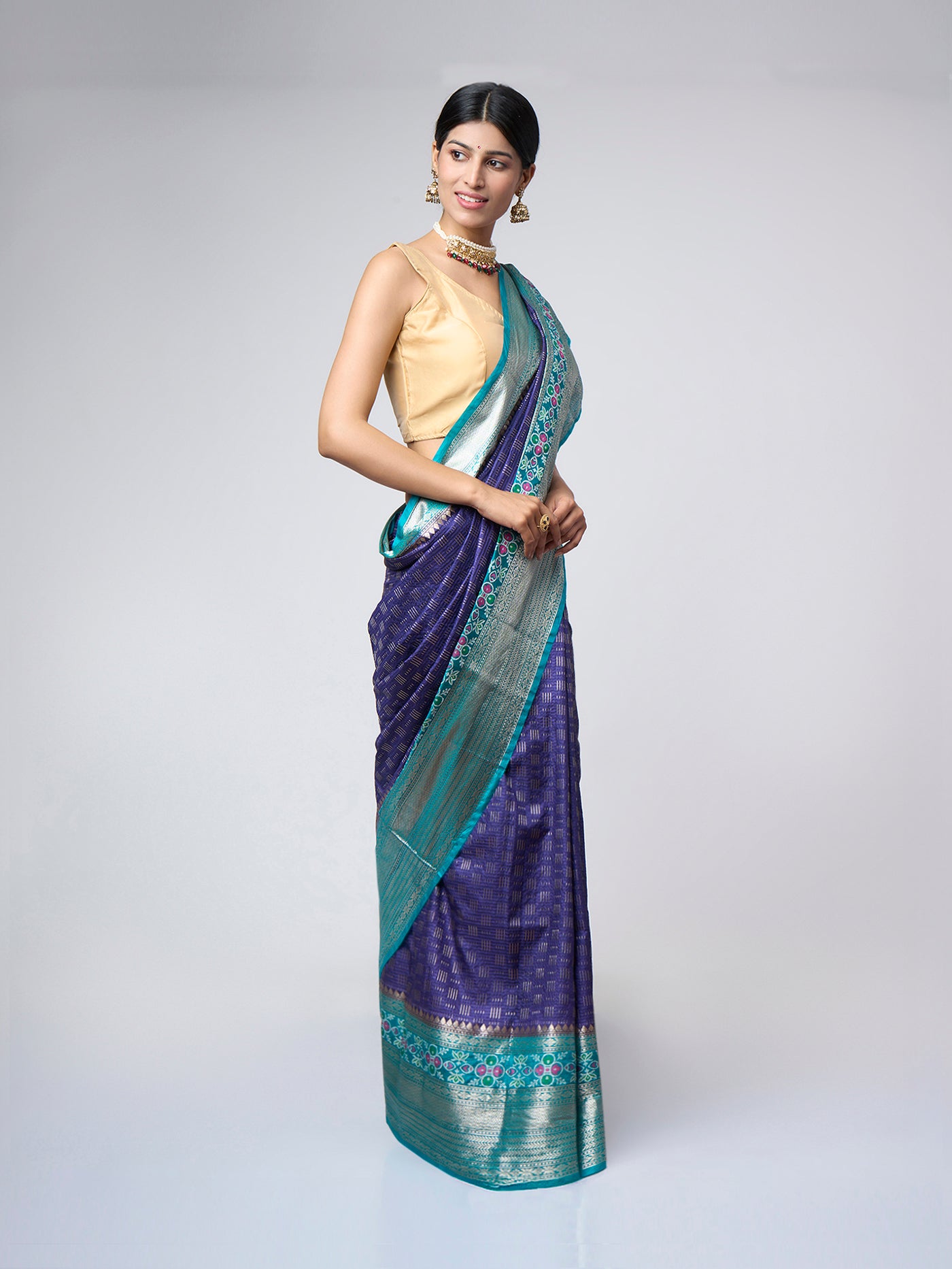 Vyanita - Navy blue silk blend saree with teal zari border - ZahratSaree